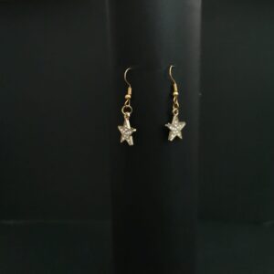 OP=OP Gouden sterretjes met diamantjes.
